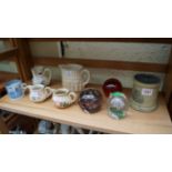 A mixed lot of ceramics, to include three glass paperweights.