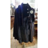 A Christian Dior mink fur cape, with belt.