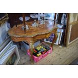 A reproduction, Louis XV style, marquetry and brass mounted centre table, of serpentine outline,