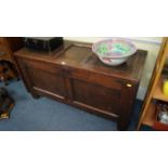 A late 17th century oak panelled coffer, 121cm wide.