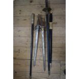 Four various reproduction swords, two with scabbards; and an Indian swordstick.