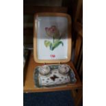 A Dresden porcelain twin inkwell stand, painted with a butterfly and flowers, 15.