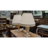 A pair of alabaster table lamps, height excluding fitting 29.5cm.