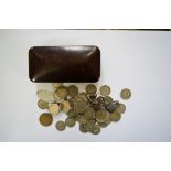 Coins: a small quantity of silver threepence coins; and a small Bakelite box.