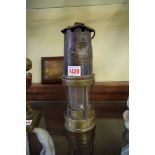 An E Thomas & Williams Ltd miner's type lamp,