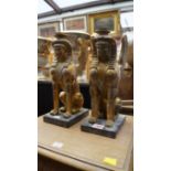 A pair of Egyptian style giltwood Sphinx candlesticks, 36cm high.