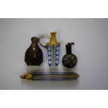 Four old scent bottles and stoppers, to include a blue and white overlaid glass example,