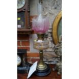 A Victorian brass oil lamp, (chip to base).