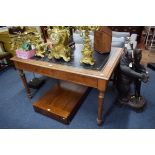 A late 19th centuy French walnut desk, with pair of frieze drawers and tapering legs, 130cm wide.