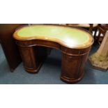 A good Edwardian figured walnut kidney shaped desk, 118cm wide.