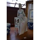 A Lladro large figure of a lady, 47cm high.