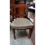 A set of six Victorian mahogany dining chairs.