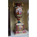 A Continental porcelain twin handled vase and pedestal, 48cm high.