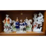 A small quantity of Staffordshire and Staffordshire style flatback figure groups,