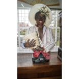 A late 19th/early 20th century Continental majolica figural bust of a Negro cotton picker,