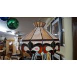 A stained and leaded glass ceiling shade,