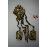 A 19th century electroplated chatelaine, with attached pin cushion, scent bottle,
