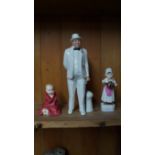 Two Royal Doulton figures, comprising: 'Sir Winston Churchill', HN3057; and 'This Little Pig',