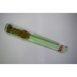 A neo-classical style gilt metal mounted green glass letter knife, 22.5cm long.