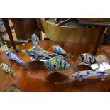 Eight various Murano glass fish, largest 56cm long.