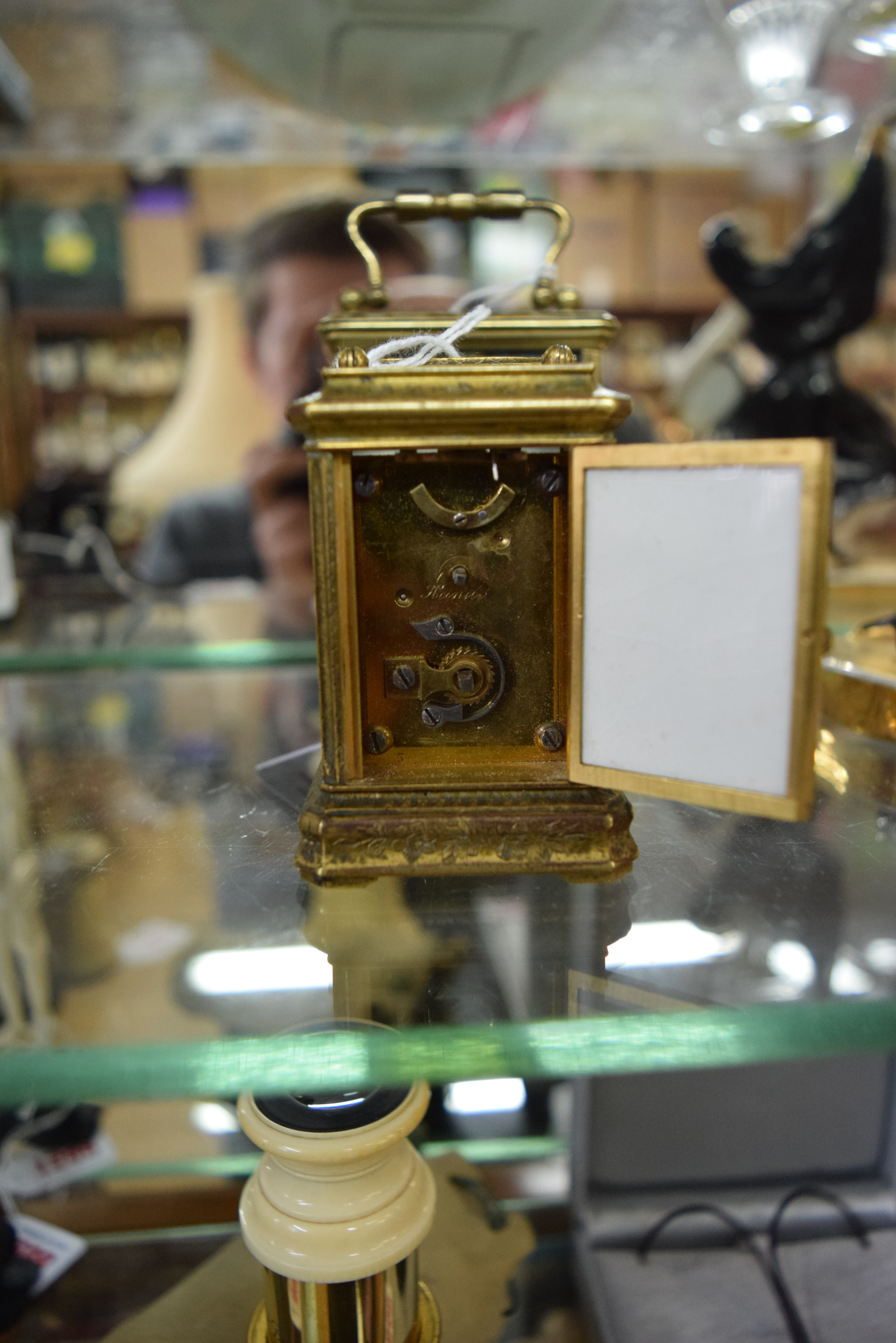 An antique engraved brass and porcelain miniature carriage timepiece, height including handle 9.5cm. - Image 3 of 5