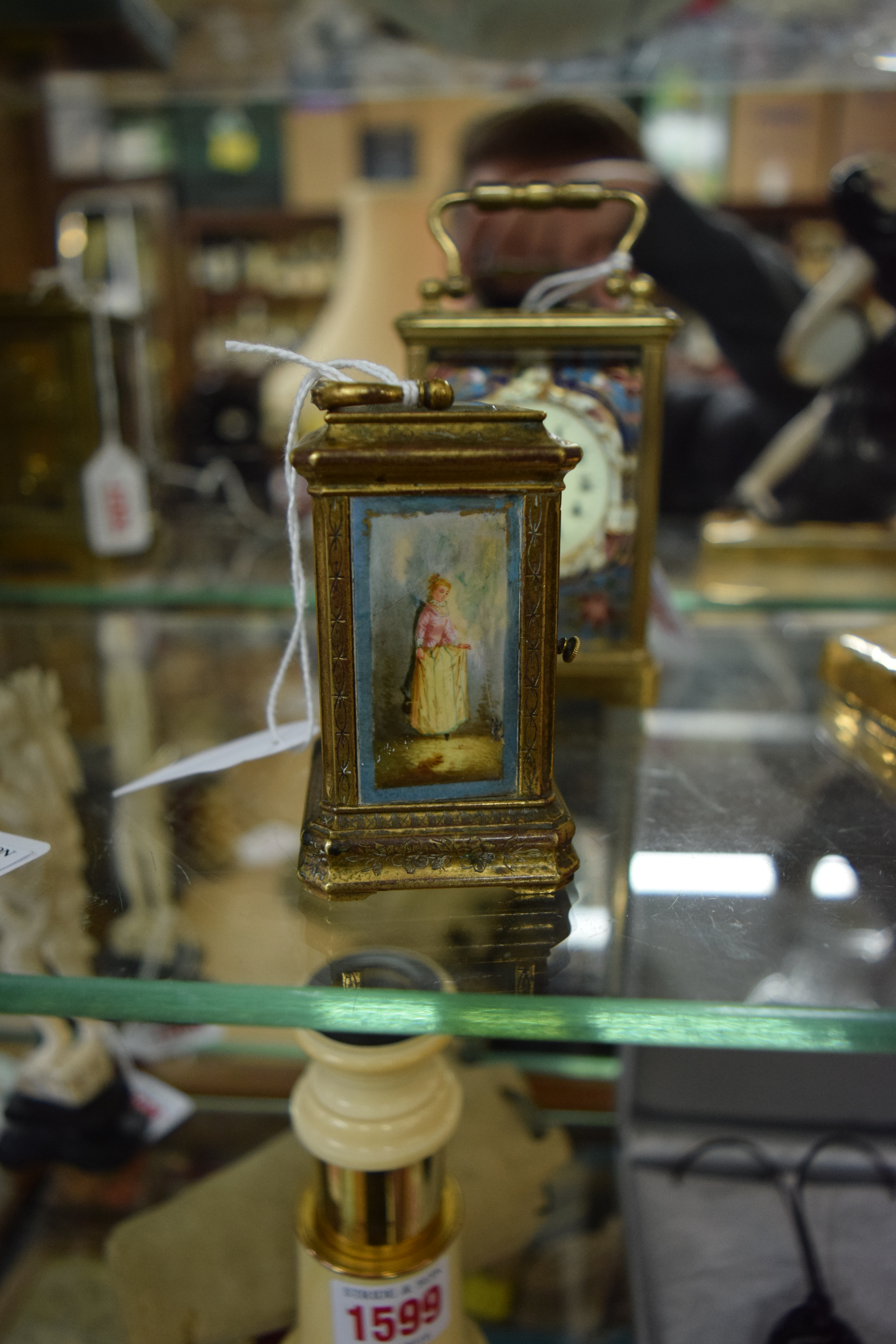 An antique engraved brass and porcelain miniature carriage timepiece, height including handle 9.5cm. - Image 2 of 5