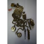 A 19th century steel chatelaine, with attached thimble case, enclosing silver thimble,
