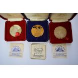 Coins: two Tower Mint sterling silver medals; together with another similar bronze medal, all boxed.