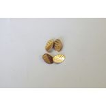 A pair of oval 9ct gold cufflinks, 4.5g.