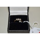 An 18ct gold and platinum diamond three stone ring.