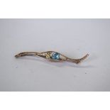 A 9ct gold brooch set blue topaz and seed pearls, 6cm, (pin base metal).