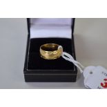 An 18ct gold wedding band, 6.2. (not 7.2).