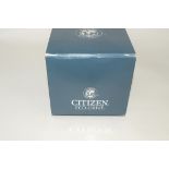 A Citizen Eco Drive gentleman's wristwatch, with box and papers.