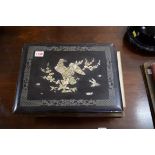 Two Oriental lacquered postcard albums, one with mother of pearl inlay the other bone,