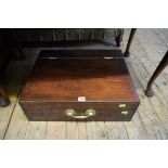 An unusual mahogany casket, the hinged top enclosing two drawers, 55cm wide.