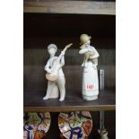 Two Lladro figures, largest 21.5cm high.