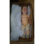 A Simon & Halbig 126 bisque head doll; together with a small quantity of doll's clothes.