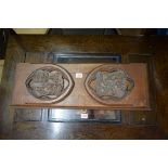 A Victorian carved oak large sliding book tray, indistinctly 'W Herman, Carver, Cabinet Maker, &c,