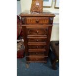 A late 19th century French rosewood and marble top bedside chest, on casters, 41cm wide.