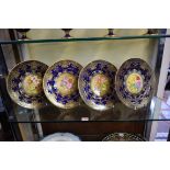 A good set of four limited edition Caverswall 'Four Seasons' cabinet plates,