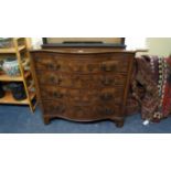 A good George III style mahogany serpentine fronted chest of drawers, with brushing slide,
