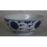 A Chinese blue and white peony bowl, Yongzheng four character mark, 17cm diameter.