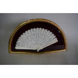 A Chinese carved ivory brise fan, 19th century,