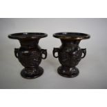 A pair of Japanese bronze twin handled vases, Meiji period,