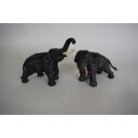 A pair of Japanese bronze elephants, Meiji period, largest 16.5cm high.