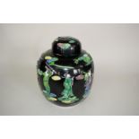 A Chinese famille noir jar and cover, raised and moulded seal mark,