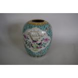 A Chinese Straits style famille rose melon jar, painted with phoenixes and peonies, 27cm high.