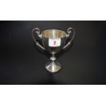 An Edwardian silver twin handled trophy cup, by W.B Ltd, Birmingham 1904, 12.