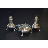 A silver three piece condiment set, by Edward Barnard & Sons Ltd, London 1931/3, 171g.