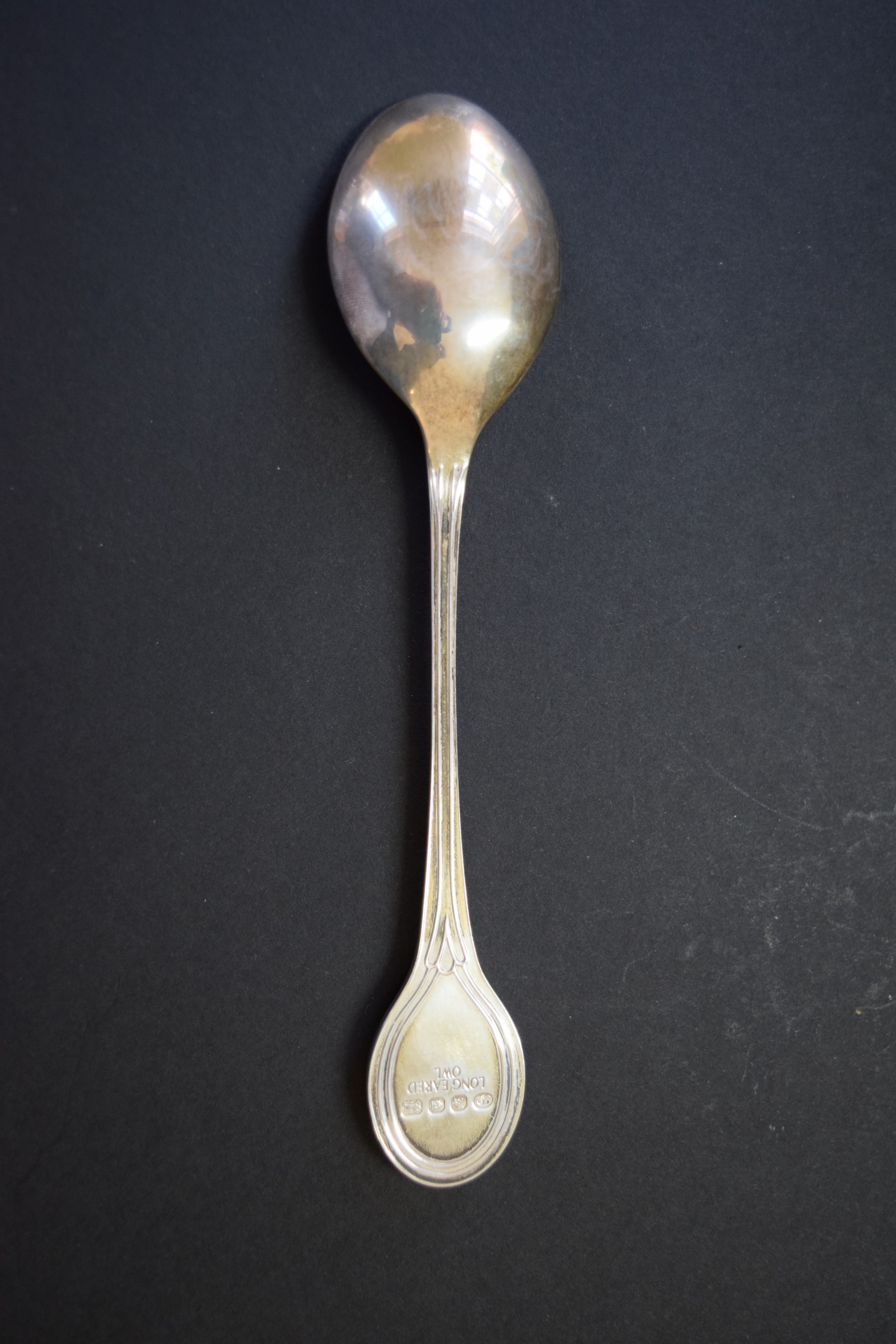 A cased set of twelve RSPB silver gilt teaspoons, by John Pinches, London 1975, 330g, - Image 6 of 8